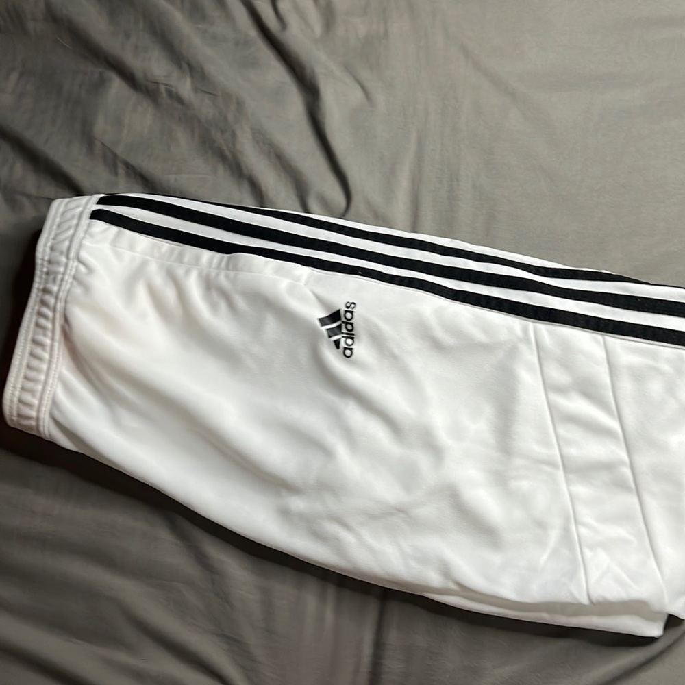 white with black striped adidas dry fit pants